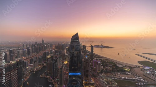 4K Timelapse - City Skyline and cityscape at sunset in Dubai UAE.