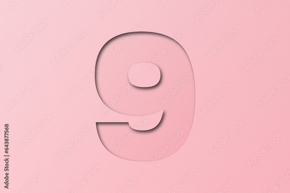 Pink confetti font number 9 isolated on pink background. Pink confetti font number 9 isolated on pink background.