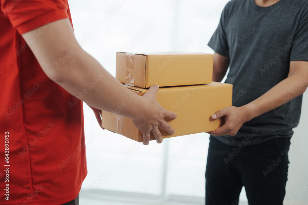 close up man on a delivery mission e-commerce logistics in action, customer satisfaction guaranteed, secure product shipment by a trustworthy courier, reliable man with a product box close up man on a delivery mission e-commerce logistics in action, customer satisfaction guaranteed, secure product shipment by a trustworthy courier, reliable man with a product box