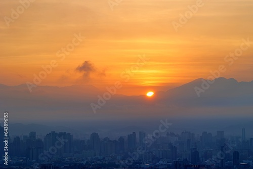 Sunrise over Taichung City with Mountains in the Background