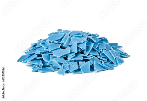 blue flake plastic waste isolated on white background. pile of blue flake plastic waste isolated. heap of blue flake plastic waste isolated
