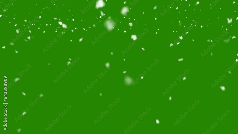 Snow falling on green background Snow falling on green background