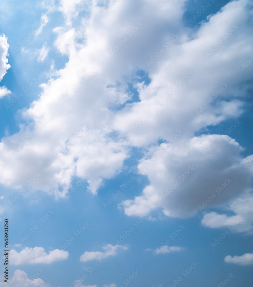 Panoramic view of clear blue sky and clouds, Blue sky background with tiny clouds. White fluffy clouds in the blue sky. Captivating stock photo featuring the mesmerizing beauty of the sky and clouds. Panoramic view of clear blue sky and clouds, Blue sky background with tiny clouds. White fluffy clouds in the blue sky. Captivating stock photo featuring the mesmerizing beauty of the sky and clouds.