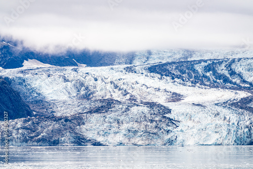 A melting blue and white glacier in Alaska