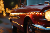 Close up of retro red car with sparkling Christmas garlands