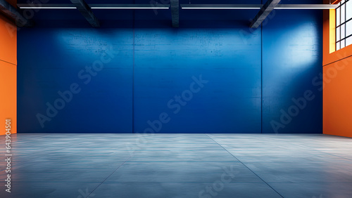 Interior wall of an empty industrial warehouse in a dynamic contrast of colors © IonelV