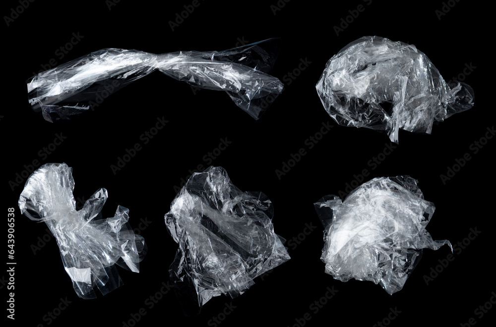 Crumpled transparent plastic bag on black
