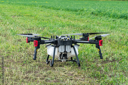 drone farm use for spray a water, fertilizer or chemical to the field, farm for growth a yields, crop. IoT Solution for Smart Agriculture. treatment of plants with chemicals from pests