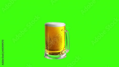 Oktoberfest Beer Festival - Beer Day - Glass with beer on green background 