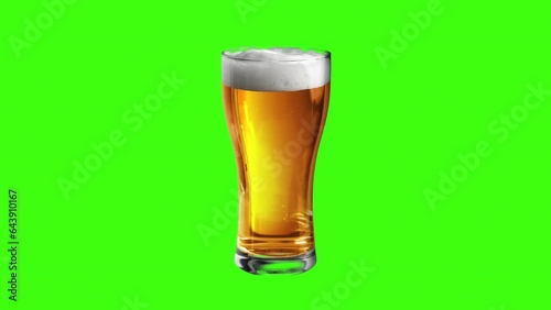 Oktoberfest Beer Festival - Beer Day - Glass with beer on green background 