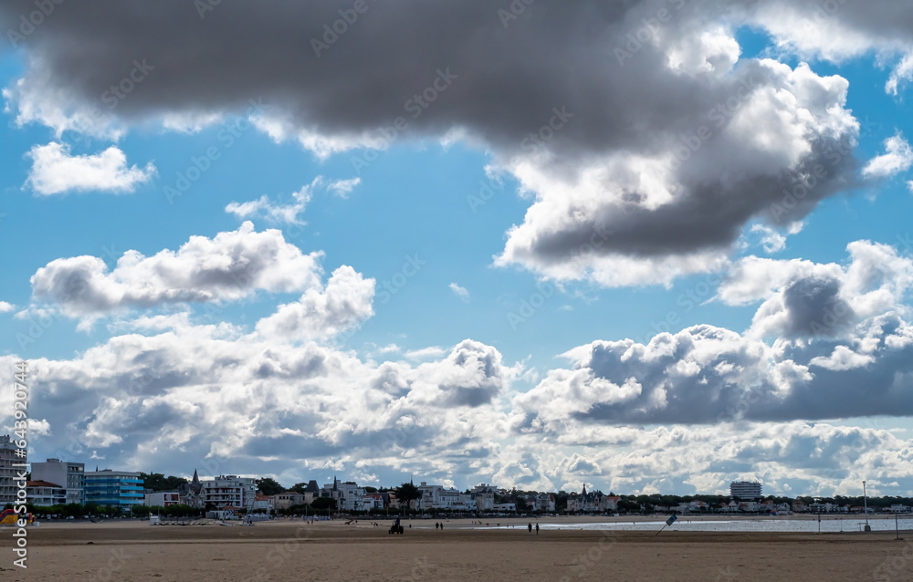 view of Royan beach at cloudy sky, in Charente Maritime, France view of Royan beach at cloudy sky, in Charente Maritime, France