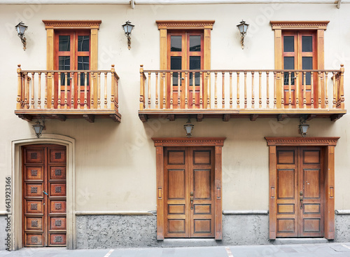 Street view of the old facade of a colonial building, Cuenca, Ecuador.