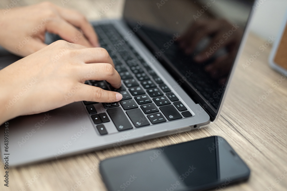 typing on laptop typing on laptop