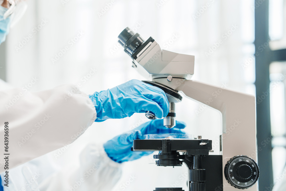 Close up scientist conducting precise virus lab test, scientific methodology, microbiologist conducting virus detection and testing in progress Close up scientist conducting precise virus lab test, scientific methodology, microbiologist conducting virus detection and testing in progress