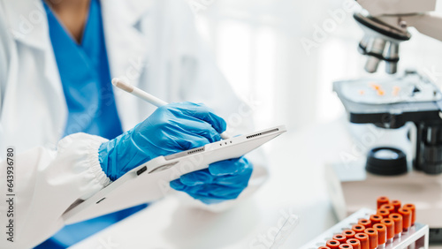 Close up scientist conducting precise virus lab test, scientific methodology, microbiologist conducting virus detection and testing in progress