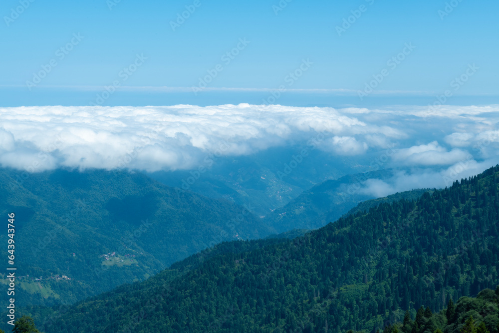 Foggy mountain landscape. Foggy and cloud-covered mountains. Foggy valleys. Foggy forest landscape. Black Sea mountains.Pokut Plateau. Kaçkar mountains. Rize, Türkiye.