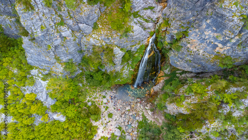 Aerial view of Grunas Waterfall in Theth National Park, Albania. Albanian Alps photo