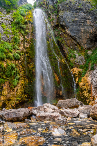 Grunas waterfall in Theth national park in summer, Albania. Albanian alps