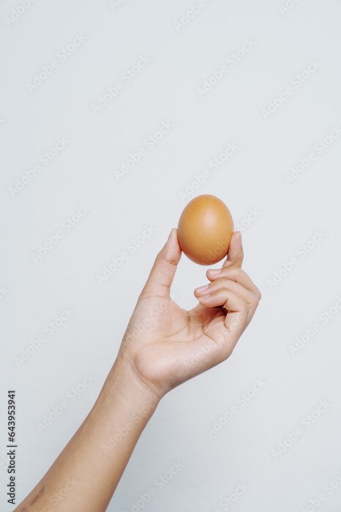 Close-up of woman hands tenderly holding free-range chicken eggs, quality assessment and natural food production, organic agriculture and sustainable living, healthy food choices and farming Close-up of woman hands tenderly holding free-range chicken eggs, quality assessment and natural food production, organic agriculture and sustainable living, healthy food choices and farming