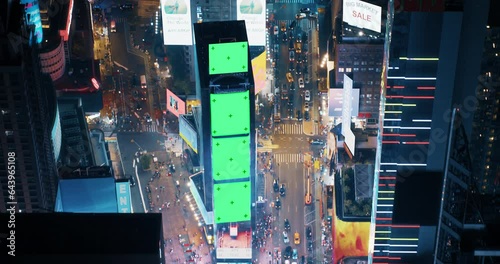 New York City Night Aerial Landscape with Manhattan Skyscrapers and Crowded Times Square Tourist Landmark. Cinematic Drone View with Green Screen Mock Up Billboards and Commercials with Neon Lights