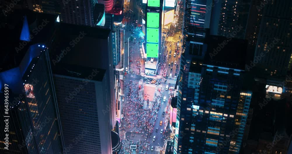 Helicopter Night Tour of New York City. Fly-By Over Glowing Times Square with Green Screen Mock Up Advertising Templates and Tourists Enjoying Manhattan Nightlife and Admiring the Landmark