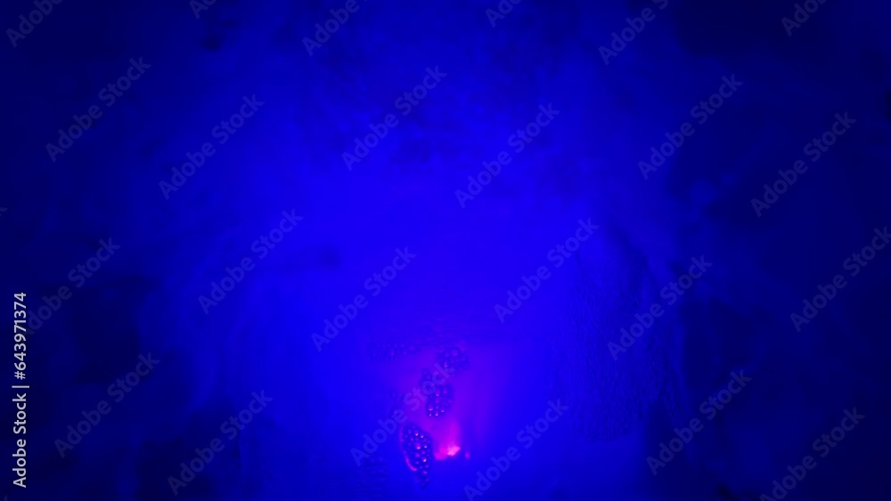 Still night video of blue illuminated clear water in jacuzzi creating a relaxing effect Still night video of blue illuminated clear water in jacuzzi creating a relaxing effect