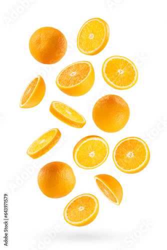 Bright oranges as flow fly or fall as art composition. Whole, half, round slices fruits isolated on white background with shadow. Tropical fruits for advertising, design, label product, poster, card.