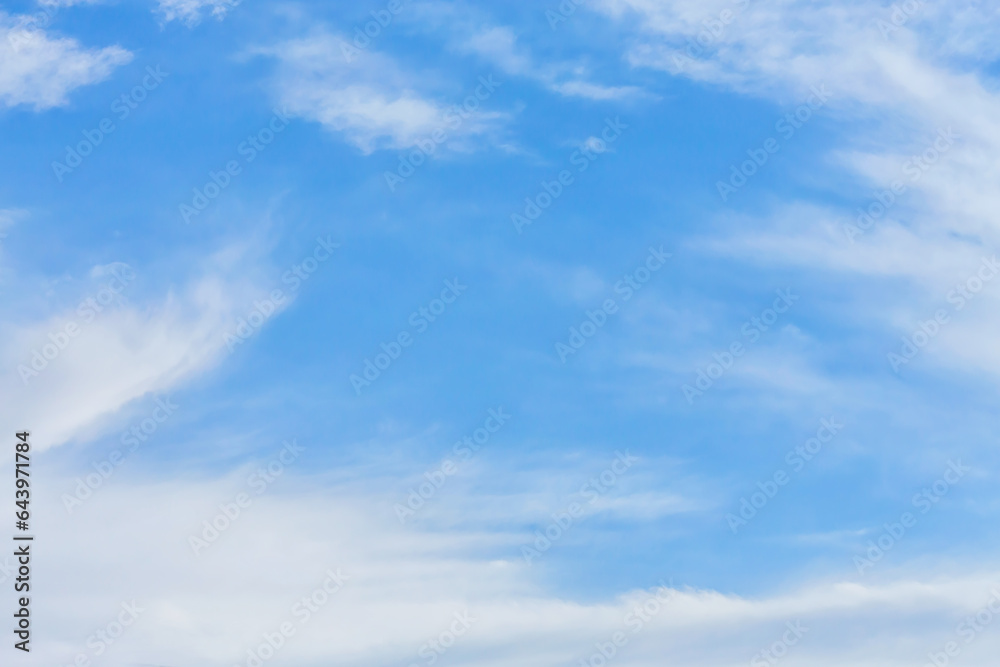 Whispy beautiful clouds at bright sunny day. Atmosphere background Whispy beautiful clouds at bright sunny day. Atmosphere background
