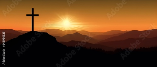 religious christian cross crucifixion on top of mountain at sunset