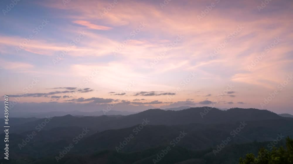 Time lapse of dramatic cloud casting over the hill valley during the sunset Time lapse of dramatic cloud casting over the hill valley during the sunset