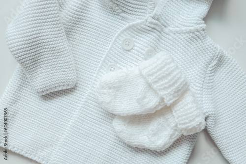 Knitted children's socks and handmade sweater