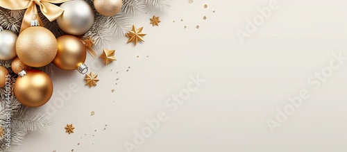 Christmas and New Year decor isolated on a isolated pastel background Copy space Artistic border with holiday ornaments Closeup of a beautiful Christmas tree adorned with golden snowflakes cone