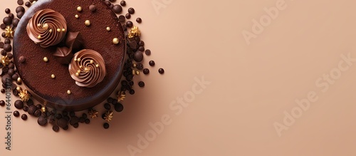 Birthday cake designed with chocolate and hazelnut isolated on a isolated pastel background Copy space