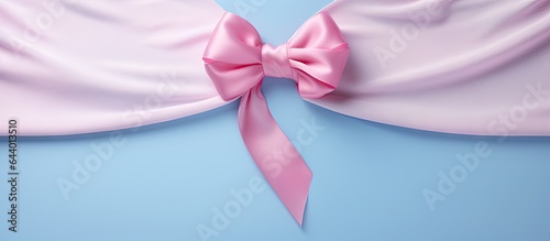 Awareness ribbon for birth defects SID infertility pregnancy loss and prenatal infection prevention on a isolated pastel background Copy space Clipping path included photo