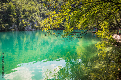 View of the beautiful clear blue Plitvice Lakes. Rocks and green trees around lakes with blue water. Breathtaking view in the Plitvice Lakes National Park .Croatia