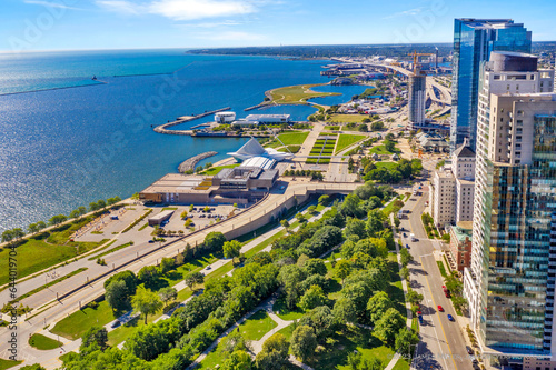 Milwaukee, WI USA - Aug 31, 2023: Aerial view of the Milwaukee, Wisconsin lakefront featuring art museum, park and apartment buildings