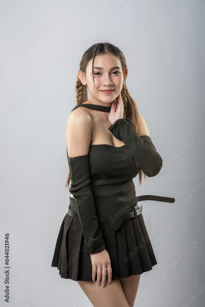 Happy young singer recording music sound through microphone in studio isolated on white background Happy young singer recording music sound through microphone in studio isolated on white background