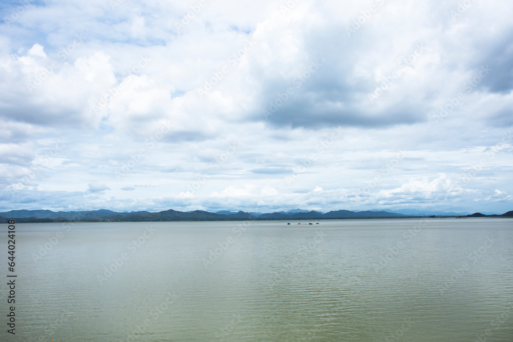 View landscape water lake and mountain in Krasiao Dam at Dan Chang district for thai people and foreign travelers travel visit rest relax on crest reservoir at Suphanburi city in Suphan Buri, Thailand