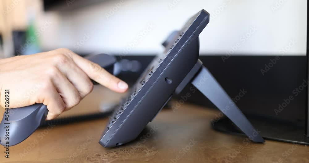Telephone with manual dialing in office. Call center services for customer concept