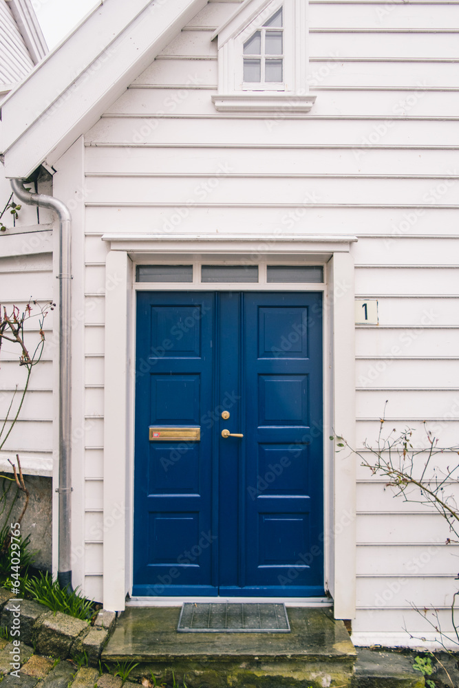 The city of Stavanger in Norway on the shore of the North Sea. Beautiful architecture, white wooden houses, beautiful doors. The city of Stavanger in Norway on the shore of the North Sea. Beautiful architecture, white wooden houses, beautiful doors.