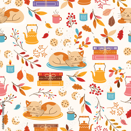 Cute cozy seamless pattern with sleepy cat, books, tea kettle, mug and colorful fall leaves. Vector illustration.