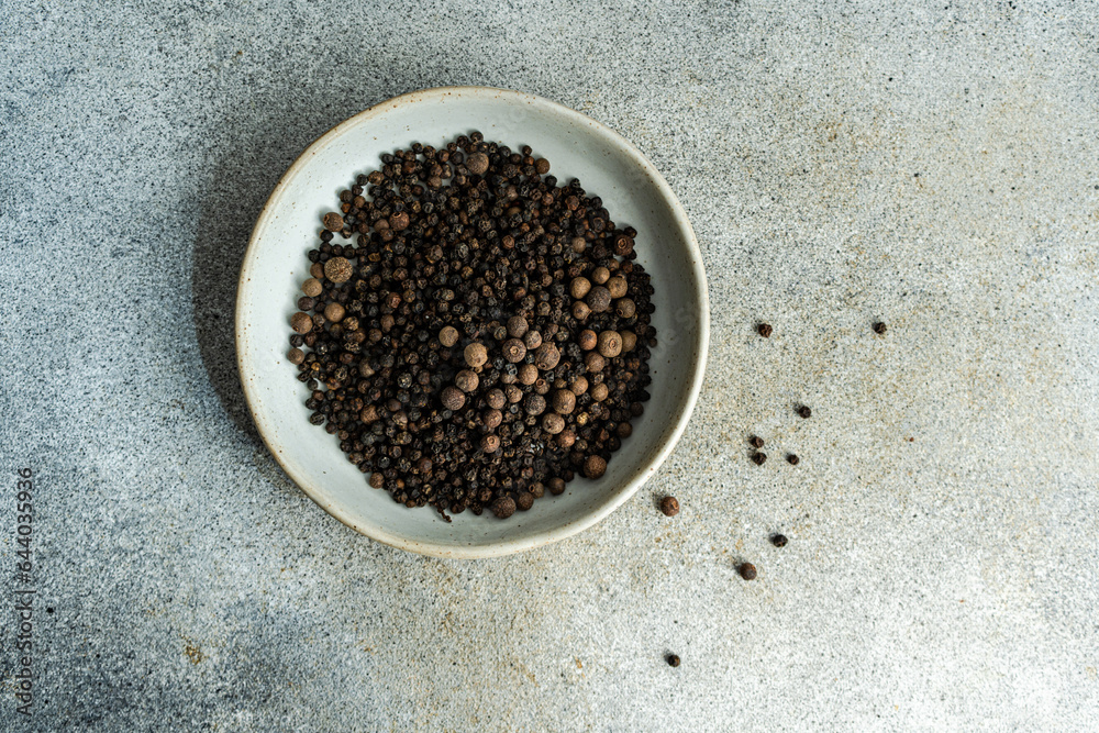 Bowl filled with natural aromatic Black pepper Bowl filled with natural aromatic Black pepper