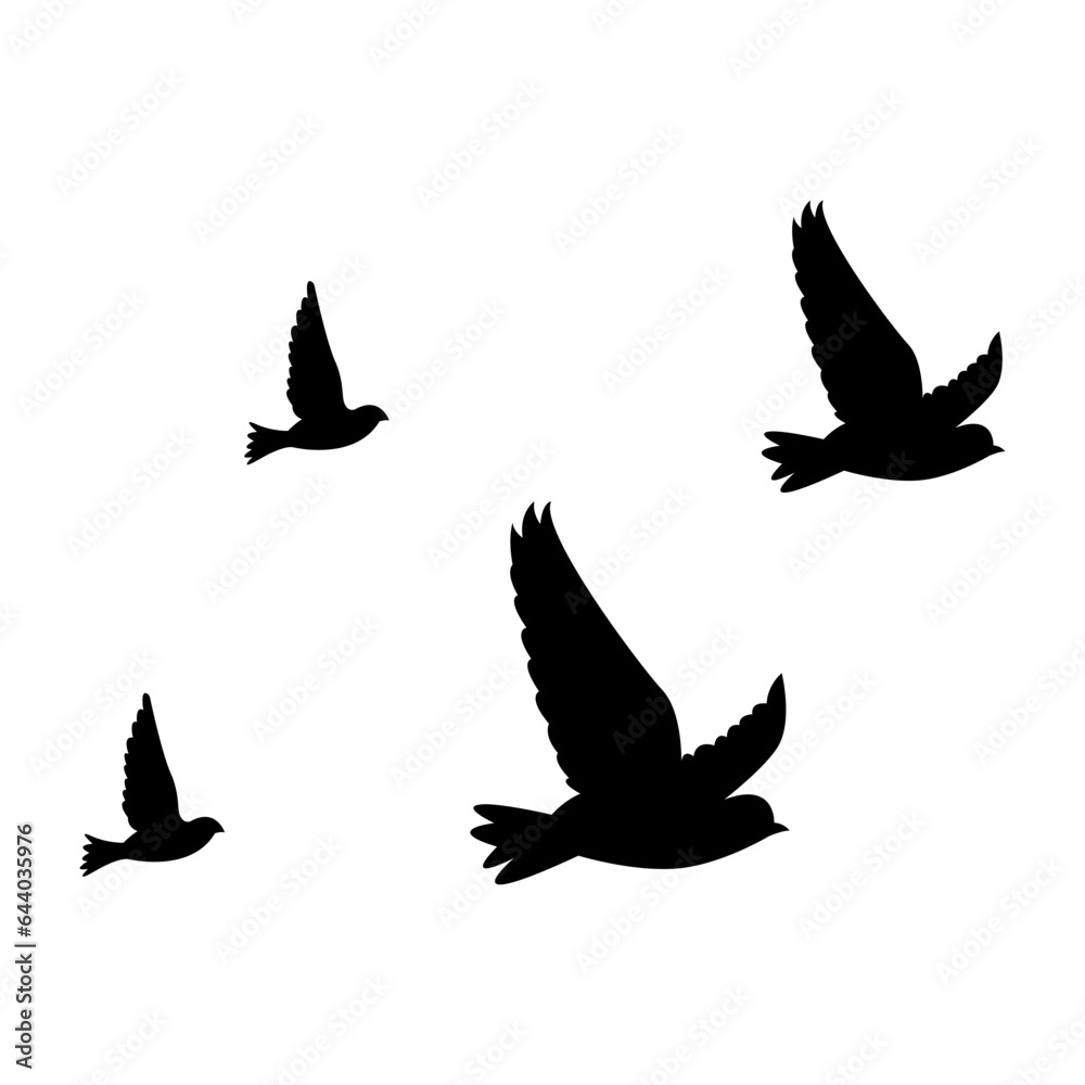 Fototapeta premium silhouettes of flock birds fly in sky