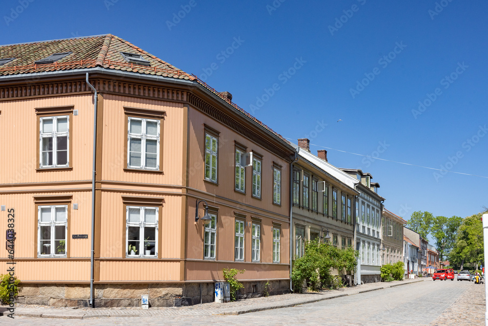 Happy walking in old city of Fredrikstad, on a great warm summer day, with many old buildings, Norway Happy walking in old city of Fredrikstad, on a great warm summer day, with many old buildings, Norway