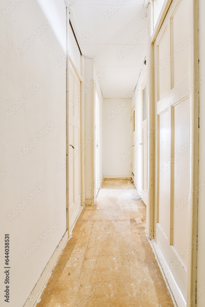 Narrow corridor with doors and lamp Narrow corridor with doors and lamp