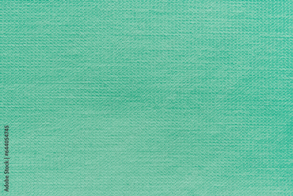 Fototapeta premium Green cotton twill fabric pattern close up as background