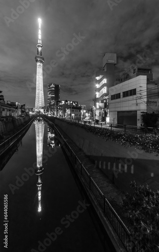 Skyline and river of Sumida Ward district in Tokyo, Japan at night