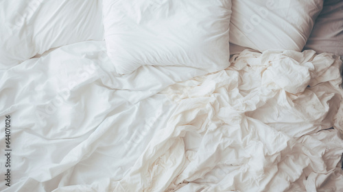 white pillows on a bed, top view