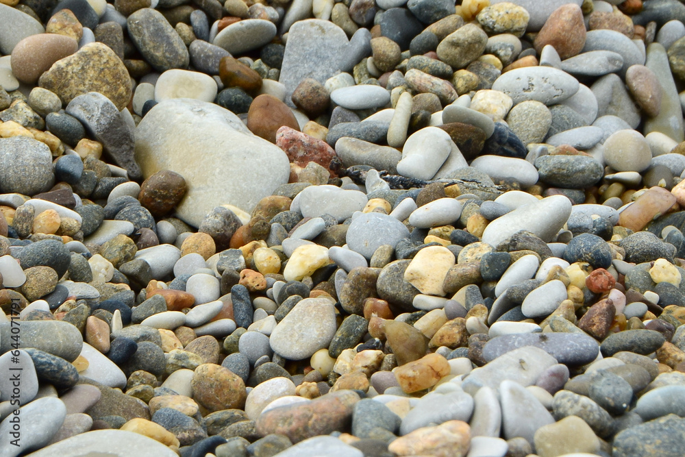 Abstract nature pebbles background. Texture of blue pebbles. Stone background. Sea pebble beach. Beautiful nature