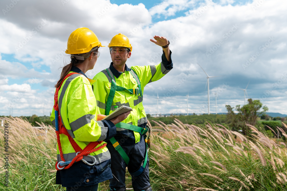 people engineer are wearing a protective helmet on head, using tablet Analytics engineering data people engineer are wearing a protective helmet on head, using tablet Analytics engineering data